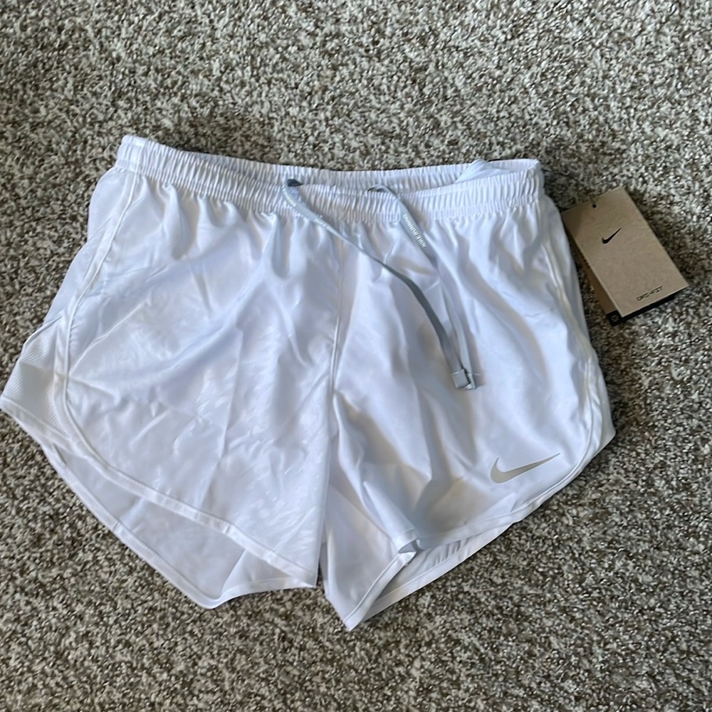 Brand new Nike white running shorts.